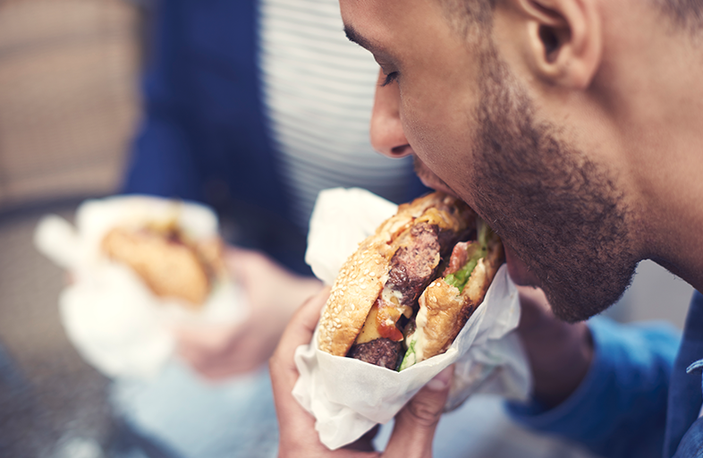 Man eating a hamburger